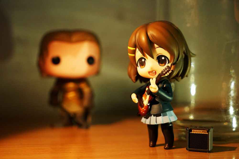 brown haired female anime character figure